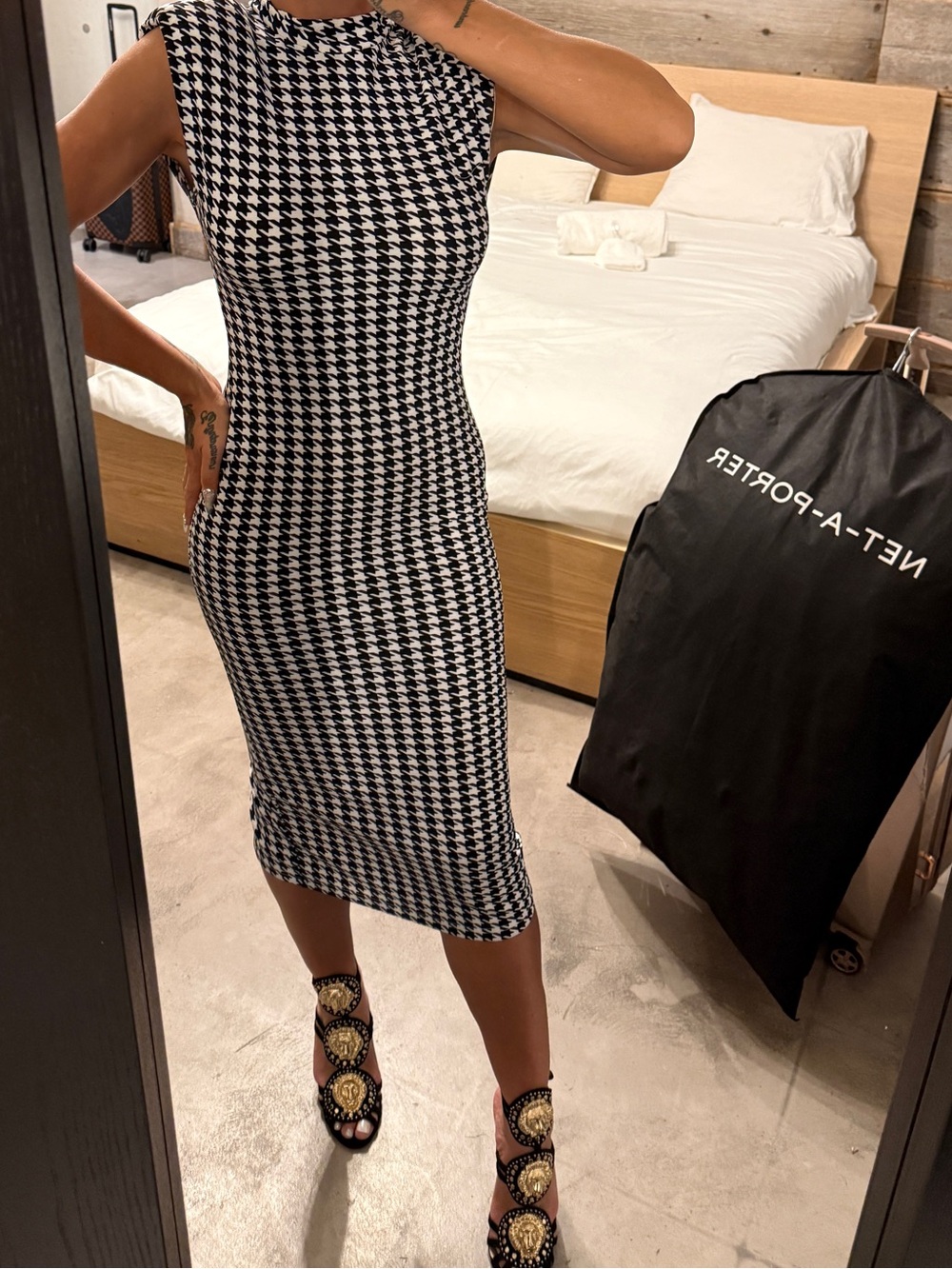 Sleeveless Houndstooth Midi Dress in black and white with shoulder pads bodycon